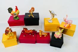 Eight boxed enamel trinket boxes, animal form and other.
