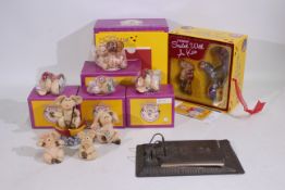 A group of Piggin' figures, part boxed and a vintage copper desk diary.