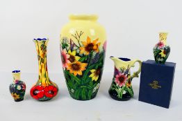 Five pieces of Old Tupton Ware, all with floral decoration, four vases and one jug,