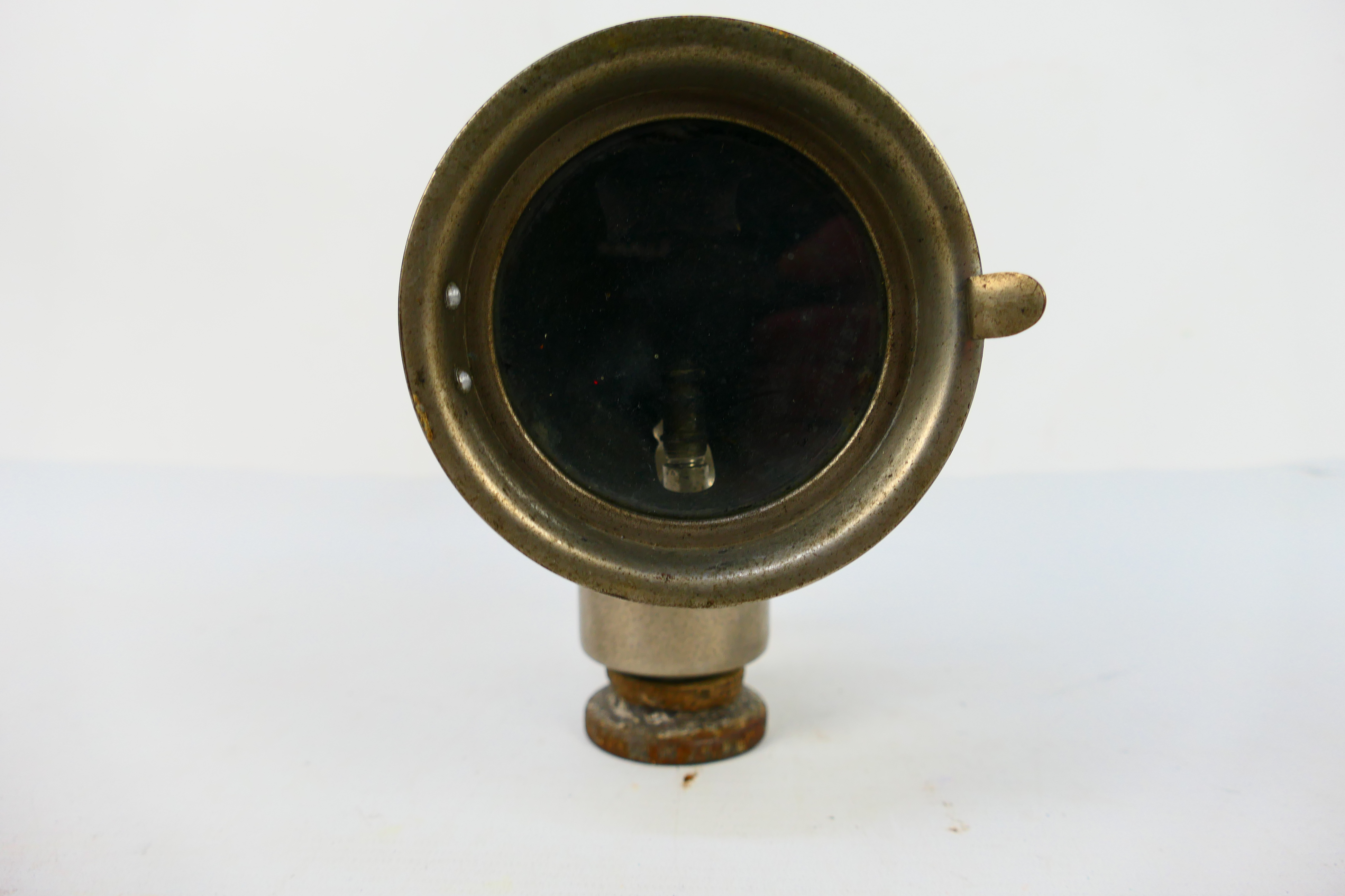 A vintage acetylene or carbide bicycle lamp with 2¾" clear glass lens, approximately 15 cm (h). - Image 3 of 4