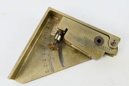 A German Third Reich Wehrmacht field artillery clinometer, bearing a Waffenamt stamp and dated 1934,