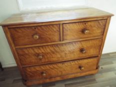 A Victorian light mahogany chest of two over two drawers measuring 88 cm x 106 cm x 42 cm.