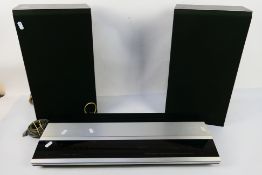 Bang & Olufsen - A Beomaster 2000 and a pair of Beovox X35 speakers. [3].