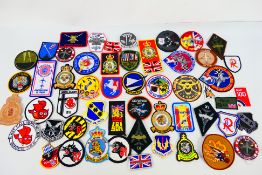 A good collection of aviation / squadron related cloth and similar patches.