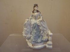 Royal Doulton - a figurine depicting Cinderella,