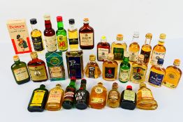Twenty nine vintage whisky miniatures predominantly 1⅔ fl oz and 70° proof to include Cutty Sark,
