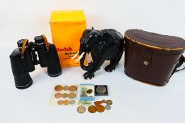 A mixed lot to include Prinzlux 10x50 binoculars contained in leather case, carved wooden elephant,