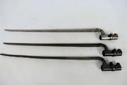 Three British socket bayonets.