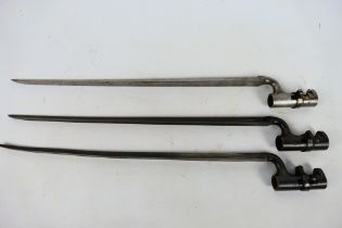 Three British socket bayonets.