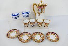 Profusely decorated Noritake coffee wares and two Chinese blue and white bowls and covers.