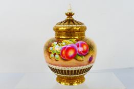 Royal Worcester - A later 20th century potpourri vase and crown cover decorated with fallen fruits