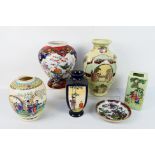 A collection of Oriental ceramics comprising vases and a shallow bowl,