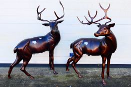 A large pair of bronzed metal stags, approximately 82.5 cm (h). [2].