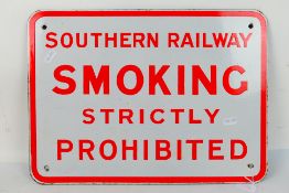 A Southern Railway enamel sign Smoking Strictly Prohibited, approximately 30 cm x 42 cm.