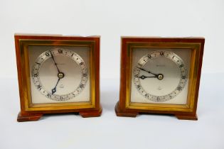 A pair of Elliott mantel clocks retailed by Prestons Ltd, 13 cm (h). [2].