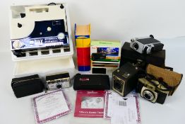 A quantity of cameras and accessories and a first edition Harry Potter And The Order Of The Phoenix.