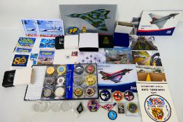 A collection of military / aviation related medallions / commemorative coins to include Royal Air