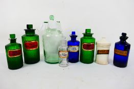 Various apothecary and similar jars to include ceramic, blue glass, green glass and clear,