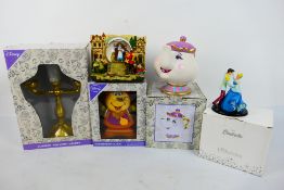 Disney - A collection of predominantly boxed Disney related items comprising Cogsworth Clock,