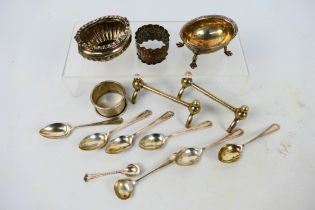 A collection of silver and white metal pieces to include open salt with gadrooned decoration,