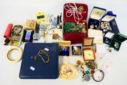 A good lot of assorted vintage costume jewellery with some silver content,