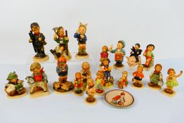 Goebel - A collection of Hummel figures with some club pieces / special edition to include Merry