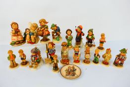 Goebel - A collection of Hummel figures to include Retreat To Safety, Little Helper, Let It Snow,