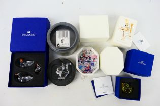 Swarovski - A collection of boxed Swarovski crystal to include a squirrel, ducks,