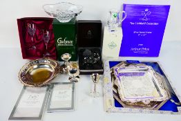 A quantity of plated ware and boxed crystal wares.
