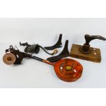 Vintage items to include shoe lasts, meat grinder, bench sharpener and other.