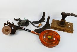 Vintage items to include shoe lasts, meat grinder, bench sharpener and other.