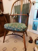 Ercol - A Chairmakers, double bow, comb-back Windsor armchair.