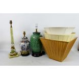 Three table lamps and shades to include a tall green onyx and brass example.