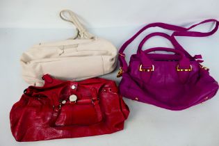 Three handbags to include Domo, Radley and Mulberry.