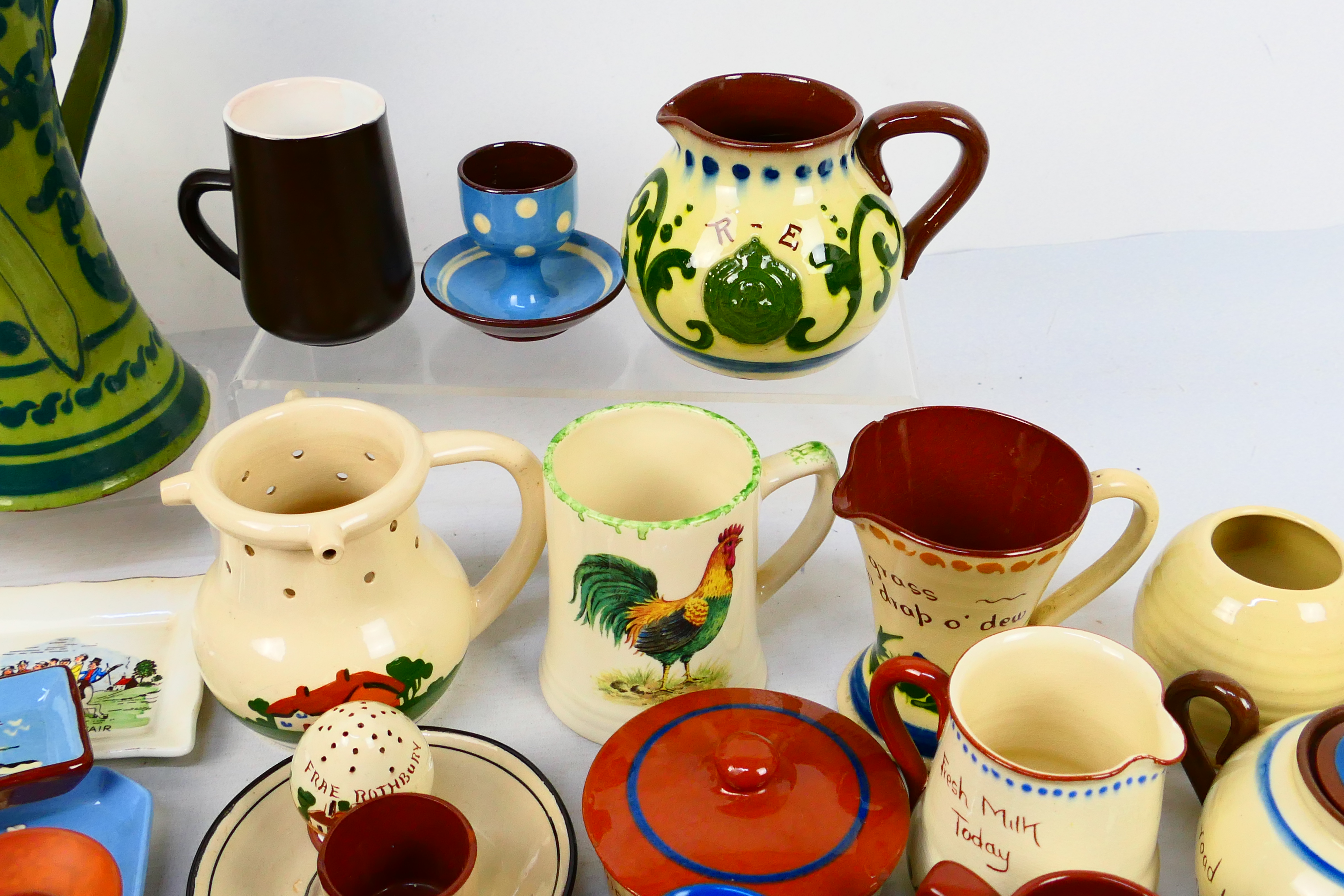 A collection of Torquay pottery wares to include bowls, jugs, vases, - Image 3 of 8