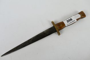 A fighting type knife with wooden grip and brass crossguard, 16 cm (l) blade.