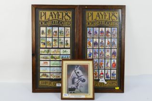 Two framed and glazed displays of John Player & Sons cigarette cards,