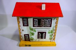 GB Toys (Gee Bee) - A vintage GB Toys wooden two storey Dolls House measuring approximately 40 cm