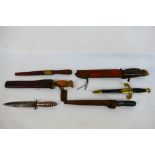 A collection of vintage knives and similar.