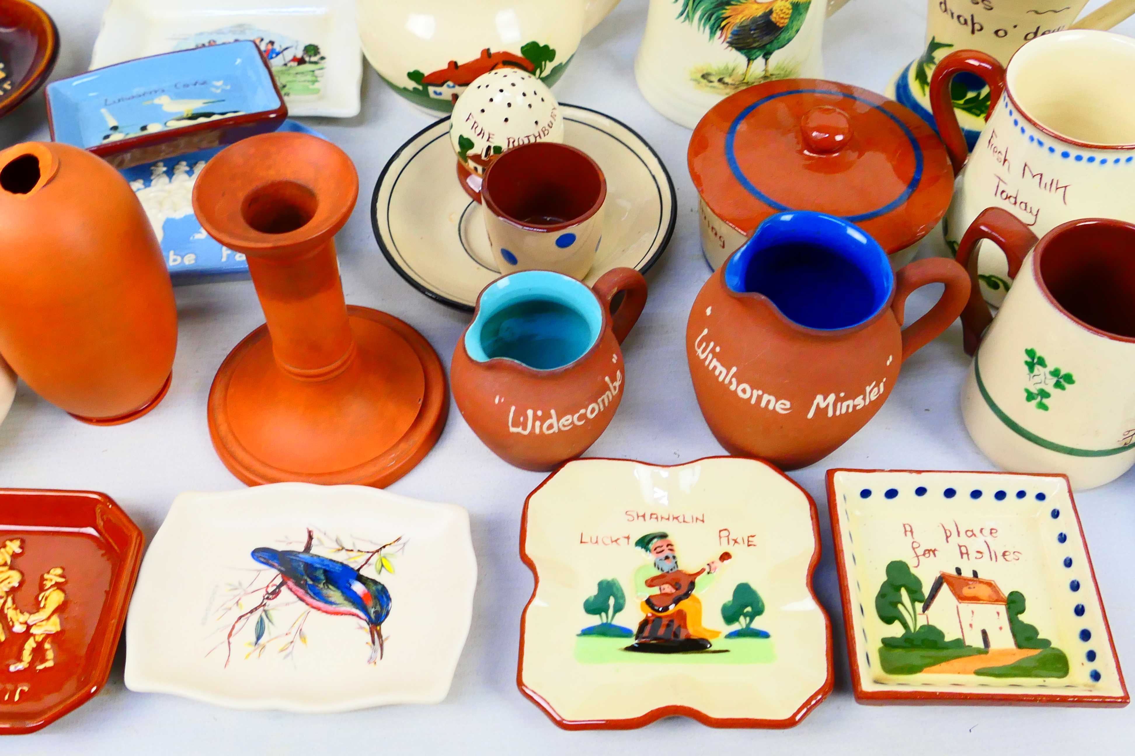 A collection of Torquay pottery wares to include bowls, jugs, vases, - Image 7 of 8