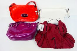 A collection of handbags to include Mulberry, Vinbagge and other.