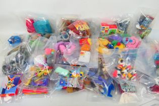 McDonalds - A large collection of plastic McDonalds toys.
