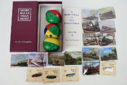 A vintage juggling set and a quantity of Atlas Editions train plaques.
