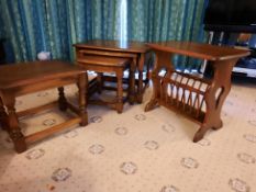 Ercol - Lot to include an occasional table with magazine rack undertier, a nest of three table,