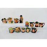 A collection of Royal Doulton small character jugs and a Winston Churchill Toby jug,