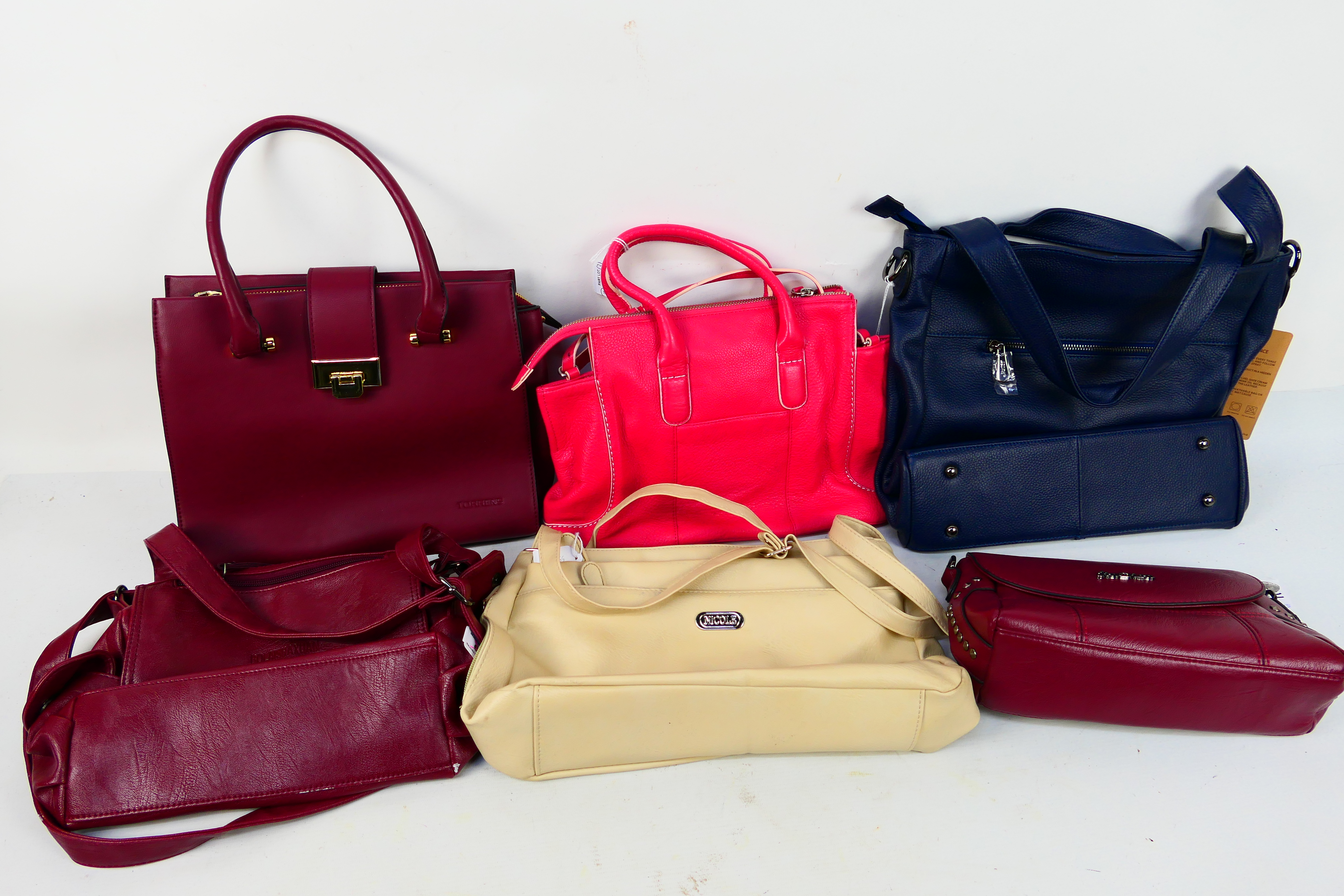 A collection of handbags to include Bolaishaxuan, S-Zone, Jindian and other.