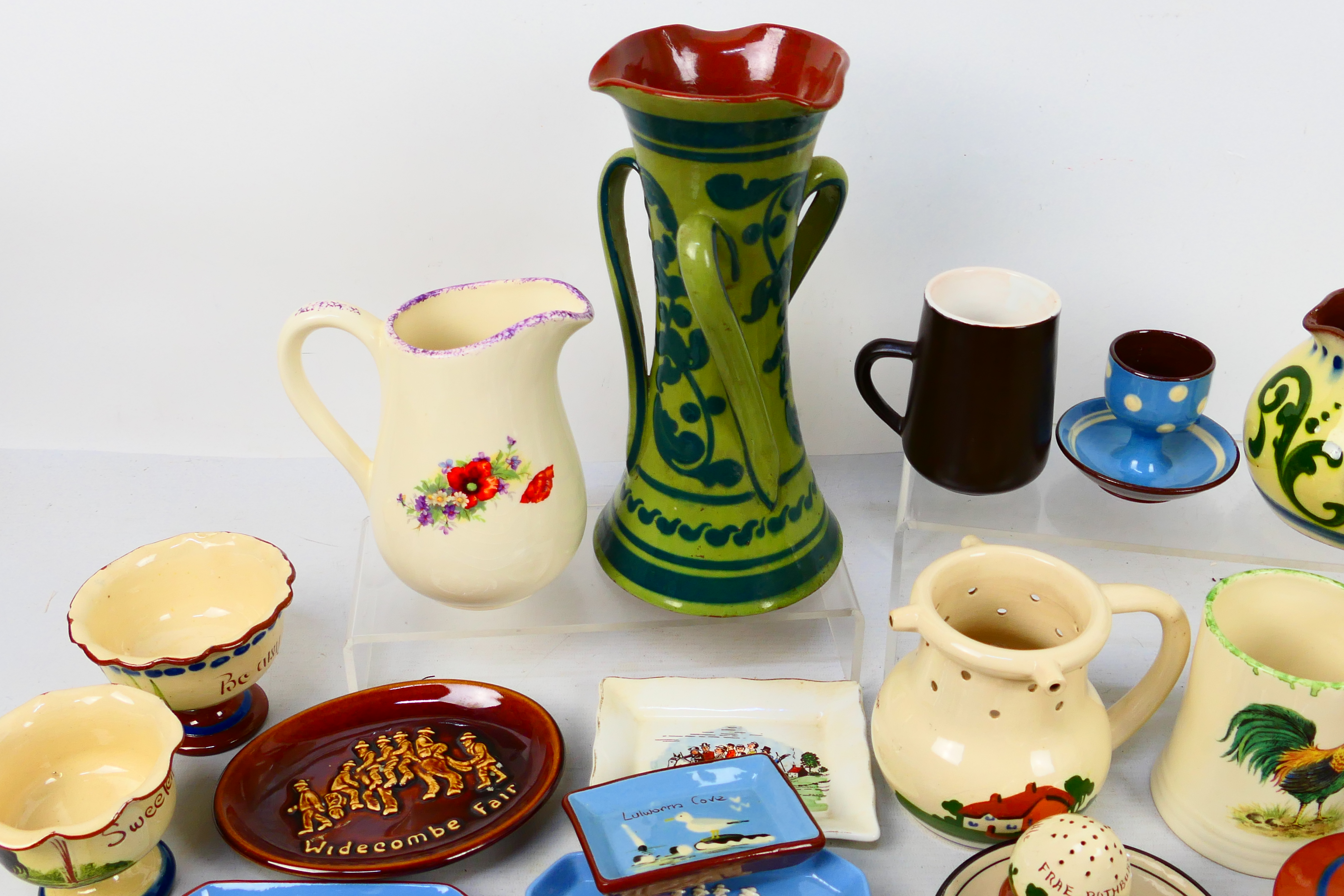 A collection of Torquay pottery wares to include bowls, jugs, vases, - Image 2 of 8