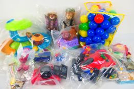 Tomy - Matchbox - Others - A group of unboxed children's toys and dolls.