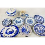 A collection of blue and white ceramics,
