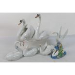 A collection of Lladro and Nao figures /